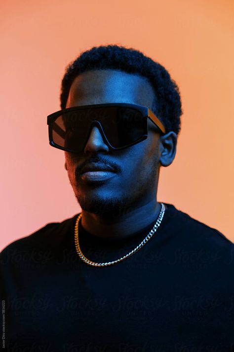 Stylish Black Man In Sunglasses In Studio by Javier Díez Model Sunglasses, Man Model, Black Man, Men Model, Male Model, Goggles, Black Men, Mens Sunglasses, Royalty Free Stock Photos