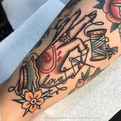 Seamstress tattoo - sewing tattoo - needle and thread - traditional tattoo Traditional Sewing Tattoo, Sewing Tattoo Sleeve, Sewing Tattoo, Sewing Machine Tattoo, Sewing Tattoos, Knitting Tattoo, Tattoos For Dad Memorial, Taurus Tattoos, Traditional Tattoo Design