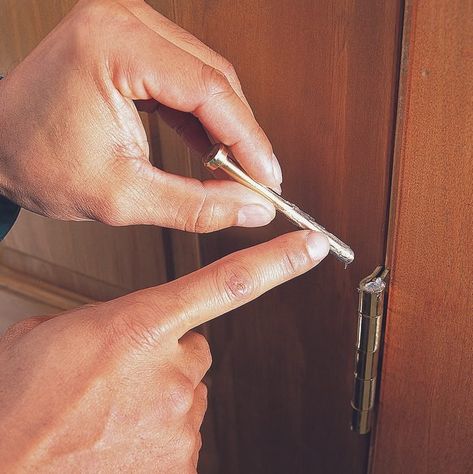 How to Silence a Squeaking Hinge (DIY) | The Family Handyman Squeaky Door Hinges, Hinges Diy, Squeaky Door, The Family Handyman, Hinge Pin, Petroleum Jelly, Cleaning Gadgets, House Doors, Family Handyman