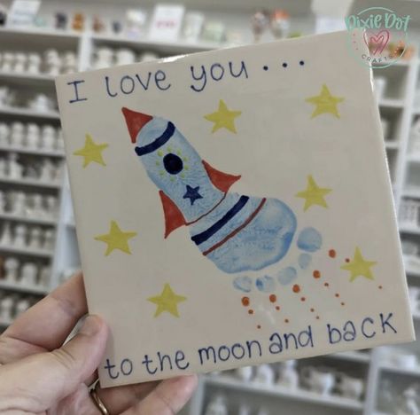 Little Feet, Big Stories: Baby Footprint Artistry Love You To The Moon And Back Footprint, Footprint Pottery Ideas, Baby Footprint Pottery, Baby Pottery Painting Ideas, Baby Feet Painting Ideas, Footprint Rocket, Baby Painting Ideas, Baby Keepsake Gifts