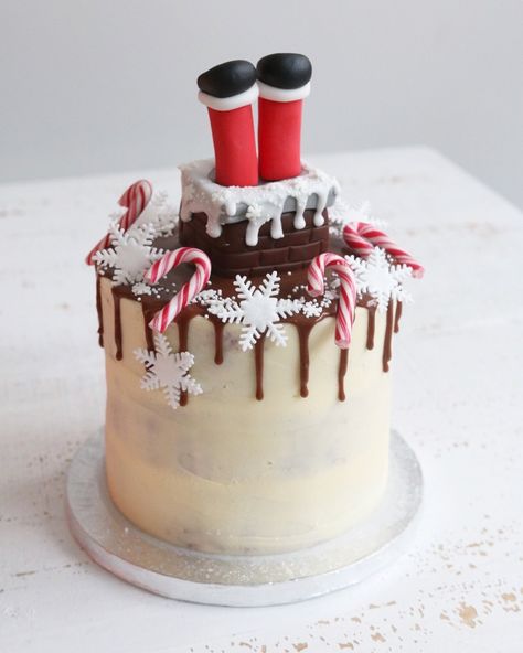 We're hoping Santa doesn't get stuck but if he does it will still be a sweet Christmas with our Santa Legs drip cake. This 6" Victoria Sponge cake with milk chocolate drip is topped with candy canes, snowflakes and Santa stuck in a chimney! Make your cake even more special by adding a personalised plaque with a message of your choice or our Santa Legs Cupcakes. Order online and collect from our store in Claygate, Surrey. Allergy information: contains eggs, milk, soya and wheat flour containing g Santa Stuck In Chimney, Buttercream Drip Cake, Buttercream Drip, Christmas Themed Cake, Chimney Cake, Christmas Cake Designs, Cake Christmas, Mini Tortillas, Christmas Cake Decorations