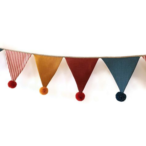 A custom made vintage circus themes inspired linen bunting garland for nursery, kids room or your celebration. Bunting banners are from 4 different linen colors (yellow, blue, red, white-red striped). Optional: with / without hand made alpaca yarn pom pom. COMPOSITION - linen - linen twine - additional: alpaca yarn pom poms. SIZE Each flag is ~13 x 13 cm (~5,11 x 5,11 inch). in 100 cm - 7 units in 200 cm - 14 units, etc. Circus Baby Room, Vintage Circus Nursery, Vintage Circus Theme, Yarn Pom Poms, Felt Bunting, Baby Shower Bunting, Circus Decorations, Flag Garland, Christmas Bunting