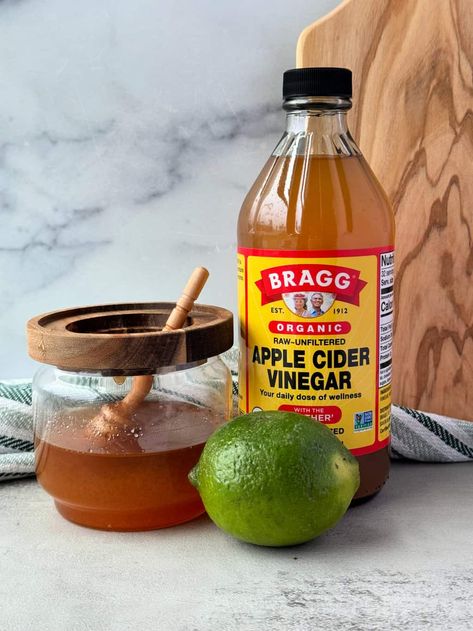 This apple cider vinegar lime and honey recipe is a warm light citrus tea. It is made with organic apple cider vinegar, lime juice and a bit of sweet raw honey. Skip the heavy breakfast and opt for a light, invigorating drink! This recipe combines the tang of apple cider vinegar with the bright, citrusy bite of lime. Honey adds a touch of sweetness to create a perfectly balanced beverage. #applecidervinegardrink #applecidervinegarlimeandhoney Health Benefits Of Lime, Heavy Breakfast, Apple Cider Vinegar Health Benefits, Apple Cider Juice, Citrus Tea, Raw Honey Benefits, Cinnamon Drink, Vinegar Drinks, Honey Drink