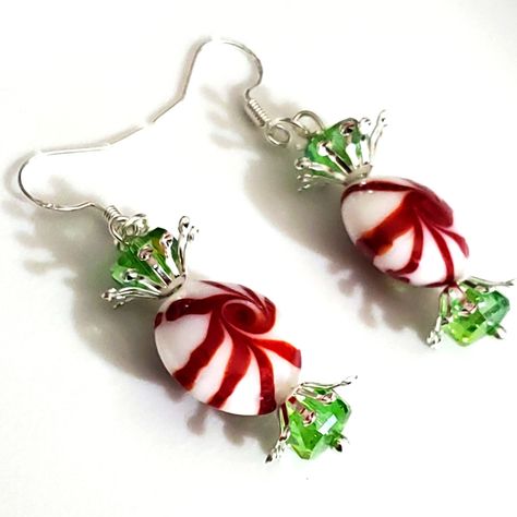 Handmade By Me In Birmingham Alabama! I Have These Red Peppermint Earrings In A Very Similar Version That Has Been Really Popular On Here And Other Selling Apps! They Are Made Acrylic Candy Beads, These Are Made With Glass Lamp Beads Lampwork Beads In A Peppermint Swirl! I Have Used Green Ab Swarovski Crystal Beads And Silver Plated Bead Caps To Make These Look Like The Candy Wrappers! I Have Used Stamped 925 Sterling Silver Ear Hooks, I Can Customize These With Leverbacks, Hoops, Ball Studs, And Many More Styles! These Are A Little More $ Than My Acrylic Ones They Cost Me More. Measures 2" Long Newly Made For Christmas Holidays 2023! Perfect Gift! I Have Red And Green Acrylic Peppermint Candy Jewelry Diy, Grinch Jewelry Diy, Christmas Ornament Earrings, Handmade Christmas Jewelry, Diy Christmas Earrings Ideas, Beaded Christmas Jewelry, Christmas Bead Earrings, Bead Christmas Earrings, Handmaid Jewelry