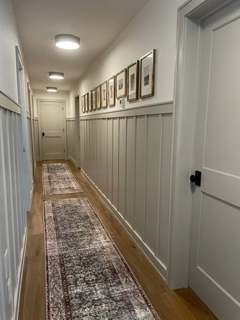 Half Wall In Entryway, Hallway Decorating Ideas Modern, Wainscoting Small Hallway, Painted Doors And Trim Hallway, Wayne’s Coating Hallway, Hallway With Board And Batten, Hallway Redo Ideas, End Of Hallway Built In, Batton Board Hallway