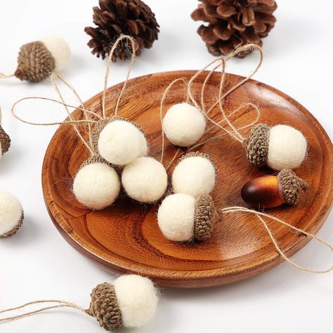 PRICES MAY VARY. Cute felt acorn ornaments: each felted acorn is hand felted with soft wool and then glued to the acorn cap; And use rope to pass through acorn for easy hanging; The felt acorn looks lovely and delicate, you will love it DIY felted acorns garlands: the package contains 18 felt acorn pendants and a roll of 32.8 ft/ 10 m rope; You can either decorate your room with felt acorn alone, such as on a tree or jewelry rack, or hang it side by side on the rope to make your own decorative g Felt Acorn, Woodland Party Decorations, Acorn Garland, Kindergarten Party, Acorn Decorations, Felted Acorns, Acorn Ornaments, Felt Ball Garland, Christmas Tree Garland