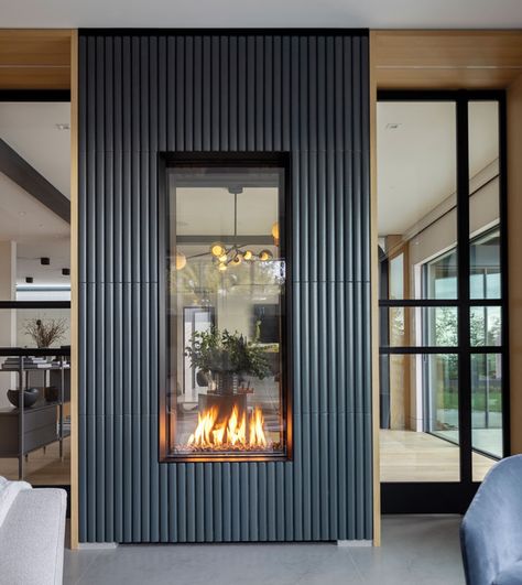 Trade Secrets: A Stylish and Functional Double-Sided Fireplace Fireplace Separating Rooms, 2 Sided Fireplace Ideas, 3 Sided Fireplace Ideas With Tv, Double Sided Fireplace Kitchen, Double Height Fireplace, Two Sided Fireplace Ideas, Fireplace In Middle Of Room, 3 Way Fireplace, Three Sided Fireplace Ideas