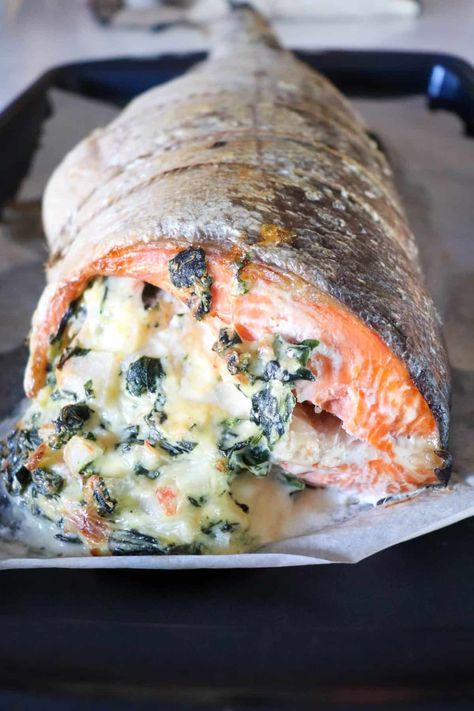 This is seriously the best stuffed salmon recipe - perfectly cooked fish, full of a deliciously creamy crab & cream cheese stuffing. Grilled Stuffed Salmon Recipes, Stuffed Whole Fish, Stuffed Whole Salmon Recipes, Stuffing For Fish Recipes, Stuffed Whole Salmon, Whole Salmon Recipes, Holiday Salmon, Whole Salmon Recipe, Grill Vegetables In Foil