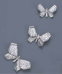 THREE ART DECO DIAMOND BUTTERFLY BROOCHES, BY BOUCHERON   Each butterfly of similar design and graduating size, with pavé-set diamond upper wings and baguette-cut diamond lower wings and body, circa 1935, 5.4, 3.9 and 3.3 cm. wide. Auctioned off by Christies of London in  their June 2002 Important Jewellery sale, for £23,900 Baguette Jewelry, Diamond Brooches, Butterfly Jewellery, Jewellery Sale, Fish Jewelry, Art Deco Brooch, Diamond Butterfly, Insect Jewelry, Diamond Brooch