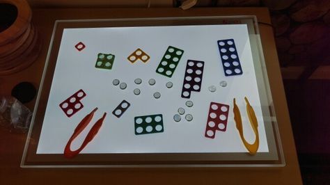 Numicon and 'jewels'! Loved this easy activity for the number of areas it hit at once - counting, fine motor, cooperation... #eyfs #earlyyears #numicon #lightbox Light Box Activities Eyfs, Light Box Ideas Eyfs, Curiousity Approach, Numicon Activities, Light Box Activities, Number Ordering, Reception Maths, Box Activities, Eyfs Maths