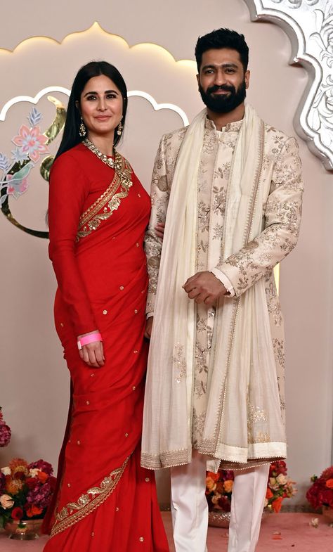 MUMBAI, INDIA - JULY 12:   Indian actor Vicky Kaushal and wife Katrina Kaif attended the Wedding ceremony of Anant Ambani and Radhika Merchant at the Jio World Convention Centre, BKC on July 12, 2024 in Mumbai, India.  (Photo by Raju Shinde/Hindustan Times via Getty Images) Indian Wedding Outfits Guest, Wedding Guests Photos, Ambani Wedding, Radhika Merchant, Indian Wedding Clothes For Men, Anant Ambani, Draping Styles, Vicky Kaushal, Reception Outfit