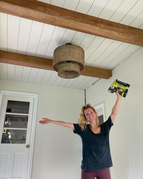 As I started my sunroom renovation I had so many different ideas for the ceiling! I contemplated between a black planked ceiling and a white planked ceiling with faux beams. Black ultimately just didn’t seem right for a sunroom in my opinion. I started by planking my ceiling using 1/4in plywood and painting it white! Then I tackled some DIY faux ceiling beams and I am so happy with how they turned out!! Here is the before! Using my stud finder, I marked my joists with electrical tape… Sunroom Renovation, Planked Ceiling, Faux Ceiling Beams, Plywood Ceiling, Diy Crown Molding, Beams Living Room, Wood Plank Ceiling, Shiplap Ceiling, Plank Ceiling