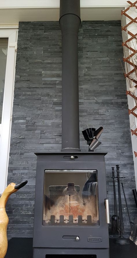 Black Wood Stove Hearth, Black Wood Stove Surround, Tiles Behind Log Burner Corner, Tile Behind Log Burner, Indoor Wood Burner, Log Burner Tiled Back, Tile Wall Behind Wood Stove, Wood Burning Stove Fireplace Surround, Wood Burner Tiles Behind