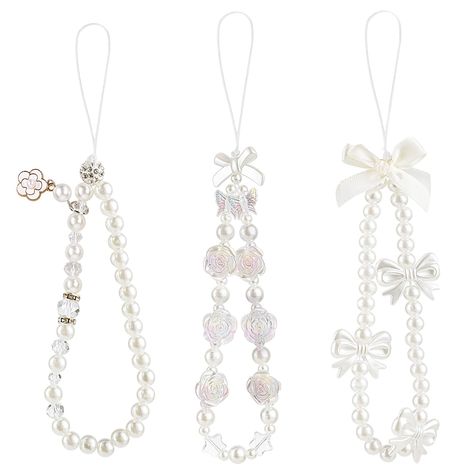 PRICES MAY VARY. 【3 Pack】3 pieces white pearl butterfly bow flower phone charms will be delivered to you under this package. 【Premium Material】This phone charms strap is made of faux pearls, acrylic beads, polymer clay and strong nylon rope, which is durable with a long service life. 【Anti-slipping】The flower phone charm strap is sturdy and durable, easy to carry, can be hung on your wrist to prevent your phone from falling or losing, its size is suitable for most people. 【Aesthetic Design】These Phone Charms Aesthetic Simple, Simple Phone Charms, Pearl Phone Strap, Phone Bracelet Ideas, Pearl Crafts Ideas, White Phone Strap, Phone Strap Aesthetic, White Phone Charm, Diy Phone Charms