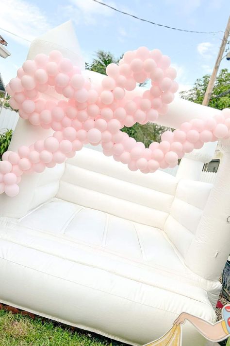 Feast your eyes on this magical princess-themed birthday party! The bouncy castle looks like so much fun! See more party ideas and share yours at CatchMyParty.com Birthday Party Themes Preppy, Coquette Bday Theme, Coquette Birthday Decorations, Bow Party Decorations, Bows Birthday Party Ideas, Birthday Party Ideas 11, Princess Party Ideas Decorations, Princess 1st Birthday Party Ideas, Bouncy Castle Birthday Party