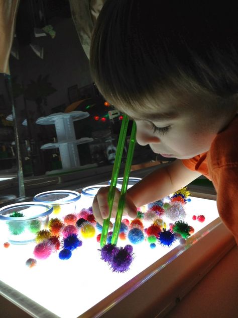 Light Box Activities, Child Playing, Light Board, Sensory Room, Reggio Inspired, Sensory Table, Fine Motor Activities, Reggio Emilia, Sensory Activities