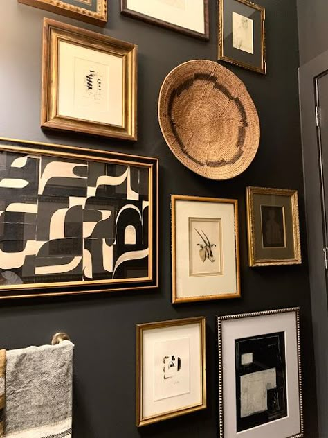 Artwork In Powder Room, Geek Chic Decor Interior Design, Decor For A Black Wall, Black Cabinet Powder Room, Art Pairing Ideas, Half Bath Artwork Wall Art, Gallery Wall Powder Room, Art For Powder Room, Powder Bath Art