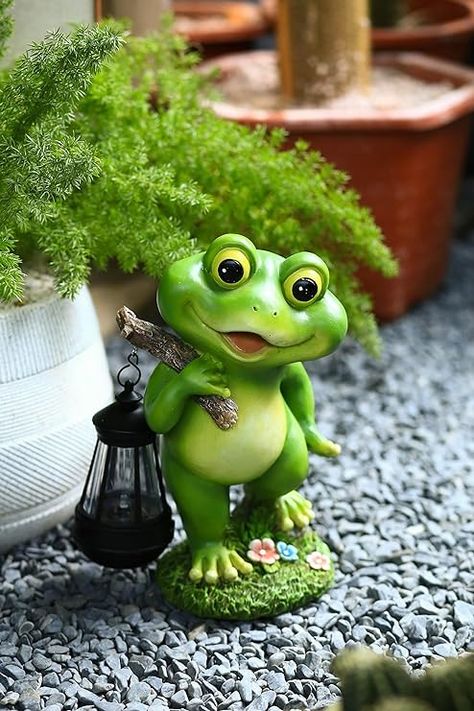 https://amzn.to/3Lrmd7z - Slike za vasu dusu Frog Garden, Frog Statues, Frog Decor, Solar Lantern, Funny Frogs, Outdoor Garden Decor, Solar Lanterns, Outdoor Statues, Cute Frogs