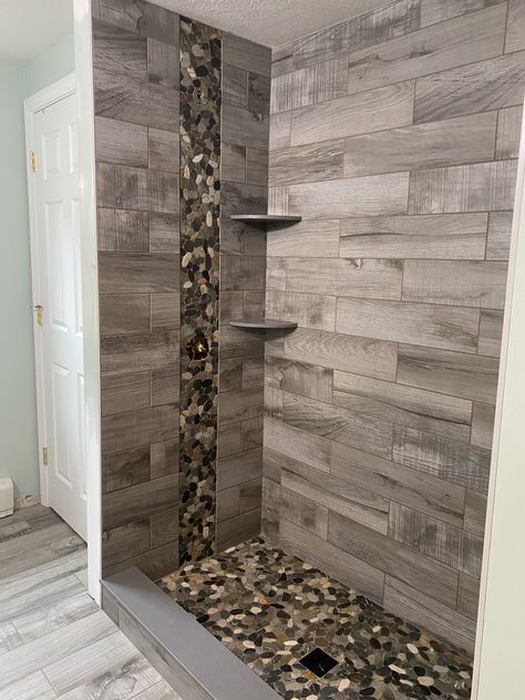 Rocks In Shower Floor, Shower Rock Tile Ideas, Bathroom Rock Tile Ideas, River Rock Bathroom Ideas, Rock Tile Bathroom Showers, Rock Bathroom Ideas, River Rock Shower, Cottage Showers, Rustic Bathroom Shower