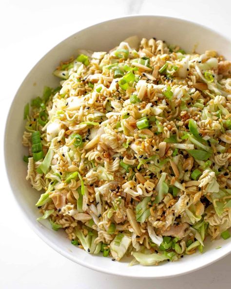 This Ramen Noodle Salad is a crunchy salad filled with rotisserie chicken, green cabbage, sliced almonds, sesame seeds, crunchy Ramen noodles, and green onions. #ramen #noodle #salad #recipe Ramen Cabbage Salad, Best Ramen Noodles, Ramen Salad, Ramen Noodle Salad, The Girl Who Ate Everything, Best Ramen, Asian Chicken Salads, Chinese Chicken Salad, Chicken And Cabbage