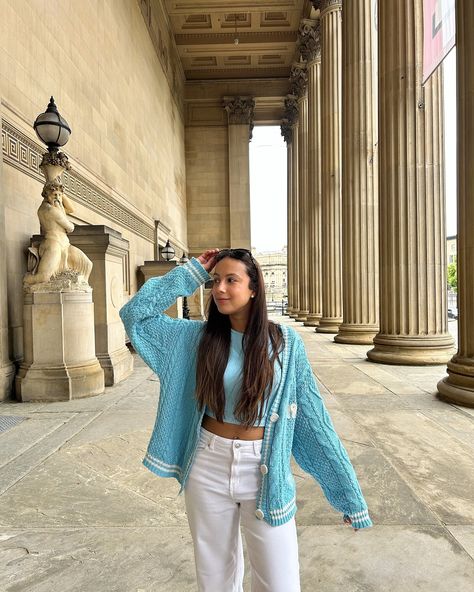 Happy Monday!🩵 Back to the Liverpool content 🇬🇧 Who said you can’t incorporate your merch in every day clothing?! I styled my 1989 cardigan with a blue cropped long sleeve top and white wide legged jeans and top it off with my 1989 sunnies and pearl earrings✨ Outfit details: Cardigan: Taylor Swift store Top: @backstagebydani Jeans: @hm What do you think about this outfit? Follow @stylingwithcath for more fashion content 🫶🏽 #longsleevetop #cardiganoutfit #swiftie #taylorswiftmerch #t... 1989 Cardigan, Taylor Swift Store, Cardigan Taylor Swift, Jeans And Top, White Wide Leg Jeans, Taylor Swift Merchandise, Wide Legged Jeans, Earrings Outfit, Baby Blue Aesthetic