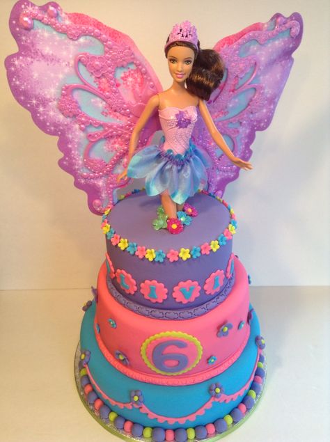 Butterfly Barbie Cake Fiesta Cakes, Columbus GA Butterfly Barbie Cake, Butterfly Barbie, Fiesta Cakes, Pink Birthday Cake Ideas, Barbie Themed Cake, Doll Cake Designs, Orange Birthday Parties, Barbie Doll Birthday Cake, Fairy Birthday Cake