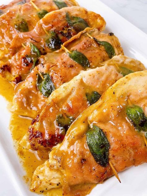 Chicken Saltimbocca on a platter with sauce Chicken Saltimbocca Recipe Giada, Chicken Saltimbocca Food Network, Chicken Saltimbocca Recipe, Saltimbocca Recipe, Juicy Chicken Breast, Chicken Saltimbocca, Veal Cutlet, Garlic Sauce Recipe, Steamed Asparagus