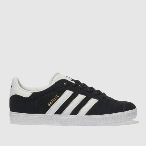 Fresher than ever, the adidas Gazelle arrives for your mini-trendsetter in a cool monochrome colourway. Downsized for kids, the iconic silhouette features a black suede upper, white 3-Stripes and gold foil branding. A durable rubber sole completes. UPPER: Suede & man-made,LINING: Fabric & man-made,INSOLE: Ortholite,OUTSOLE: Rubbercolour : Black & White Product code : 2700087250 White Gazelle, Adidas Gazelle Black, Le Rosey, Black And White Trainers, Adidas Trainers, White Product, Adidas Gazelle Sneaker, Adidas Gazelle, Adidas Superstar Sneaker