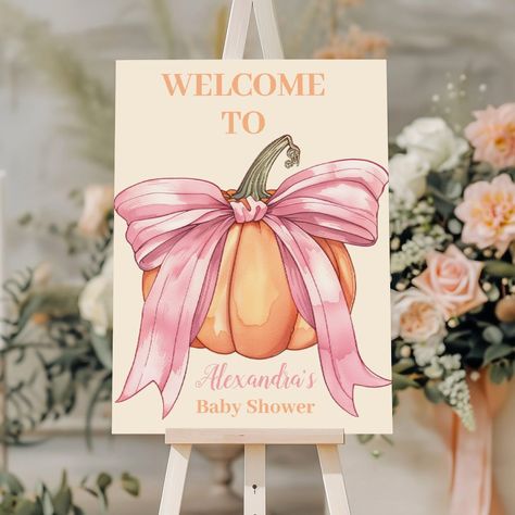 The Retro Pink Bow Pumpkin Baby Shower Foam Board is a stylish and eye-catching decorative piece that adds a touch of vintage charm to your fall-themed baby shower. This foam board serves as a perfect backdrop or welcome sign, creating a warm and inviting atmosphere for your guests.  Key Features: Retro Design: Features a vintage-inspired look with classic typography and nostalgic elements, adding a timeless and elegant feel to your event. Pink Bow & Pumpkin Motif: Adorned with a charming pink b Pink Pumpkin Baby Shower Centerpieces, Pink Little Pumpkin Baby Shower Ideas, Pumpkin Baby Shower Table Decor, A Little Pumpkin Is On The Way Decor, Pink Fall Baby Shower Ideas, A Little Pumpkin Baby Shower Theme, Pink Pumpkin Baby Shower Ideas, Bow Pumpkin, November Baby Shower