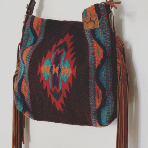 Western Saddle Blanket Bag 1515 Handmade Buy Sweetgrass Leather. Leather Fringe Crossbody Strap. Colors Are Brown,Red, Turquoise,Blue, And Orange. Zipper Closure With 2 Pockets Inside. Perfect Statement Piece For Any Outfit. No Longer Made One Of A Kind. Blanket Bag, Saddle Blanket, Western Saddle, Red Turquoise, Blue And Orange, Leather Fringe, Crossbody Strap, Turquoise Blue, Inside Pocket