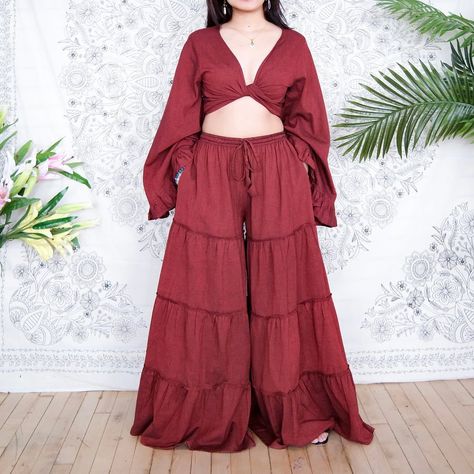 Flow freely in boho bliss with these wide-leg tiered pants and ruffle-sleeve top ensemble 🌸✨ https://karmanepalcrafts.com/products/flowy-tiered-pants #bohohippiechic #widelegpants #flowy #flarepants #bohemianstyle #plussizefashion #ootdfashion #springfashion #summeriscoming Tiered Pants, Flowy Fashion, Handmade Pants, Boho Hippie Chic, Pants Cotton, Ruffled Sleeve Top, Boho Look, Bell Bottom, Ruffle Top