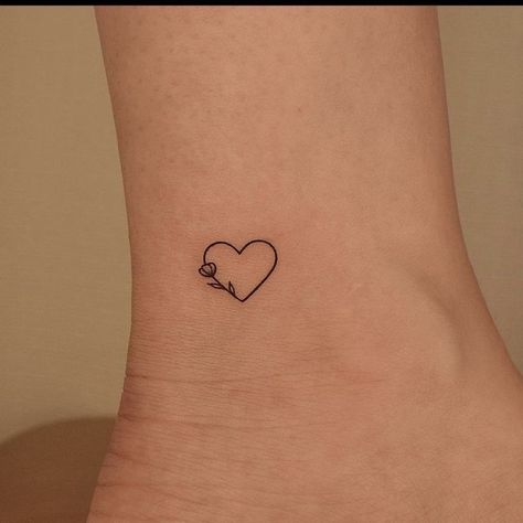 Simple Heart Tattoo Designs Ideas, Tattoos With Hearts In Them, Mini Tats Heart, Tatoos Small Heart, Fine Line Love Heart Tattoo, Heart With Leaves Tattoo, Love Tattoos For Women Small, Tiny Valentines Day Tattoos, Heart On Ankle Tattoo