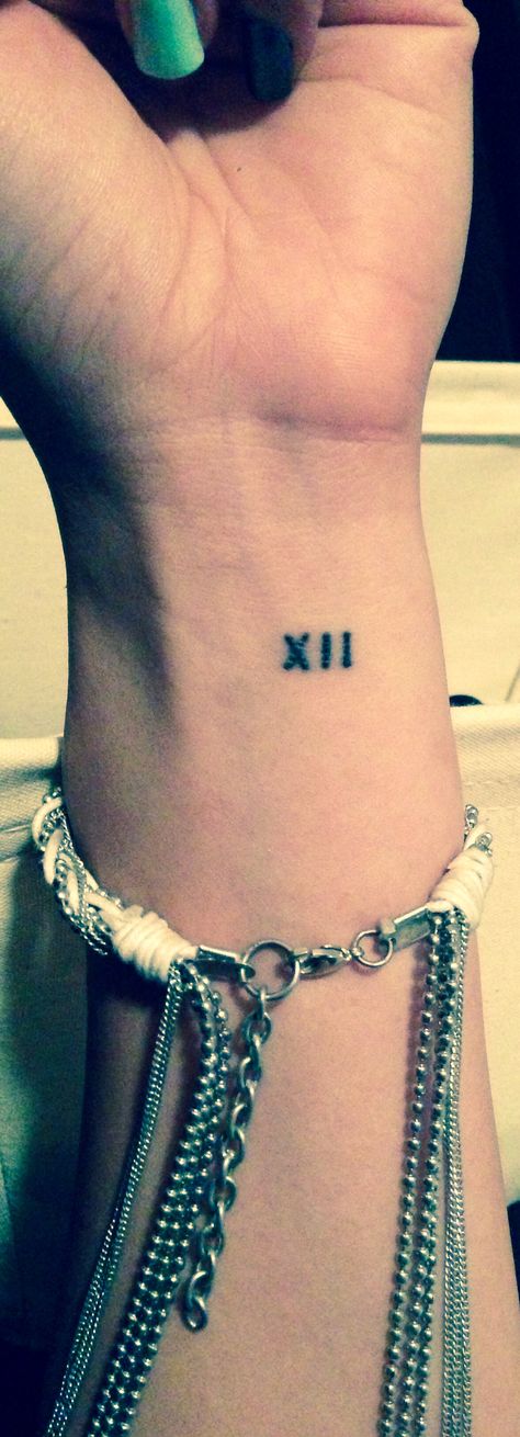 Roman numeral tattoo. XII. Lucky number Xii Tattoo, Number Tattoo Fonts, Font Tato, Tato Dengan Makna, Roman Numeral Tattoo, 12 Tattoos, Numeral Tattoo, Tato Jari, 7 Tattoo