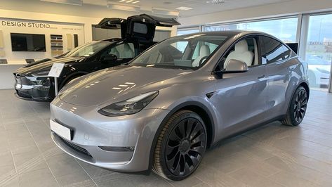 Tesla Model Y Quicksilver Color in a Tesla Showroom in Europe. Quicksilver Wallpaper, Tesla Model Y Performance, Tesla Suv, Tesla Y, Electric Suv, Cherry Red Color, European Market, Tuk Tuk, Car Carrier