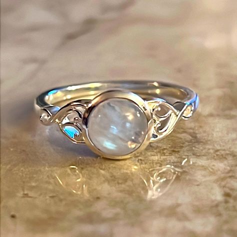 Rainbow Moonstone Ring Rainbow Moonstone Is Thought To Bring Balance, Harmony And Hope While Enhancing Creativity, Compassion, Endurance And Inner Confidence. Rainbow Moonstone Is Believed To Help Strengthen Intuition And Psychic Perception, Especially Offering Us Visions Of Things That Aren't Immediately Obvious. *Round Rainbow Moonstone *1.65 Carat *7mm *925 Sterling Silver Magic Wedding Ring, Silver And Opal Ring, Vintage Moonstone Engagement Rings, Moonstone Promise Ring, Silver Aquamarine Ring, Unconventional Wedding Rings Silver, Elegant Natural Moonstone Promise Ring, Moonstone Ring With Moon Phase For Gift, Mystical Moonstone Ring With Moon Phase