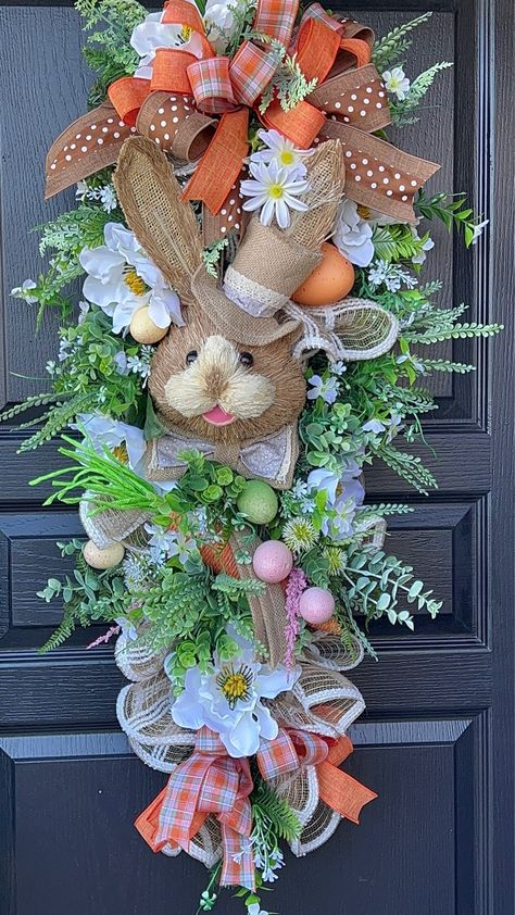 Easter Swag,Easter BunnySwag, Easter Wreath, Easter Bunny Wreath, Easter Swag With Bunny, Easter Wreath For Front Door, Sassy Doors Wreath,Home and Living, Easter Decor, Easter Door Decor, Easter Deco Mesh Wreath, Easter DecorationsThis adorable bunny is designed on a 36” evergreen swag. He is ad Evergreen Swag, Easter Deco Mesh Wreath, Easter Swags, Easter Door Decor, Easter Door Hanger, Easter Craft Decorations, Easter Items, Easter Door, Floral Arrangements Diy