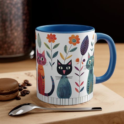 Introducing our delightful boho cat mug, a whimsical blend of cuteness and color that will brighten up your mornings and add a touch of charm to your daily routine. This mug features four adorable cartoon-style cats, each adorned with interesting patterns and flowers, creating a playful and eye-catching design. Embrace the carefree spirit and bohemian vibes with these lovable feline characters as they exude a sense of joy and playfulness that is simply irresistible. The combination of their styl Cup Cat, Cat Coffee Cups, Cats Coffee, Colorful Cat, Cat Cushion, Painted Mugs, Cat Coffee Mug, Cool Mugs, Cat Coffee