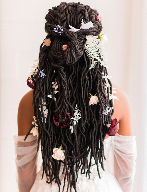 Flowers In Dreadlocks, Goddess Locs Wedding Hairstyles, Wedding Protective Hairstyles, Loc Low Bun Wedding, Bridal Hairstyles Locs, Locs And Flowers, Flowers In Locs Photoshoot, Locs With Flowers, Loc Bride Styles