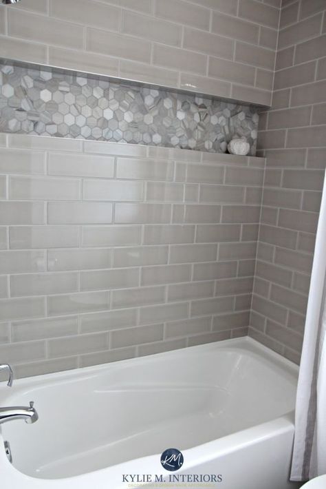 Bathroom with bathtub and gray subway tile shower surround with niche or alcove in hexagon marble tile, greige accent tile. Kylie M Interiors design Makeover Kamar Mandi, Subway Tile Showers, Bad Inspiration, Interior Minimalista, Tub Tile, التصميم �الخارجي للمنزل, Shower Niche, Bathroom Tub, Bathroom Shower Tile