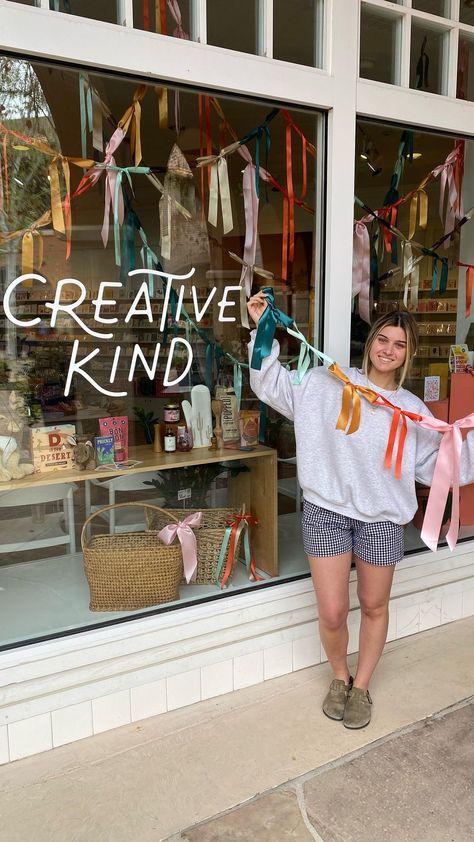 Creative Kind | Y’all can’t seem to get enough of this window display and we love to see it! 💕 Here’s a tutorial for how Mara made this cute and simple… | Instagram Simple Ribbon Bow, Autumn Window Display, Holiday Retail, Fall Windows, Bow Garland, Christmas Window Display, Bow Window, Retail Windows, Christmas Window