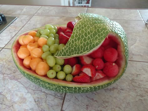 Mermaid watermelon fruit bowl Mermaid Watermelon Fruit Bowl, Mermaid Watermelon Carving, Under The Sea Watermelon, Mermaid Fruit Ideas, Mermaid Fruit Platter, Mermaid Fruit Tray, Mermaid Watermelon, Watermelon Mermaid, Mermaid Fruit