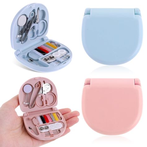 PRICES MAY VARY. Mini Sewing Kit: includes 2 pcs of foldable travel sewing kit (pink/blue). Each storage case contain the basic sewing supplies: 3 pearl straight pins, 3 hand needles, 1 small scissor, 1 threader, 1 safety pin, 2 white buttons, 2 snaps, 1 tweezers, and 6 colors of cotton thread. Material: The small sewing kit folding storage case is made of quality plastic material, which is durable and won’t break easily. Equipped with commonly used sewing repair accessories, the sewing needles Small Sewing Kit, Portable Sewing Kit, Mini Sewing Kit, Travel Sewing Kit, Travel Sewing, Hand Sewing Needles, Sewing Supplies Storage, Basic Sewing, Sewing Kits