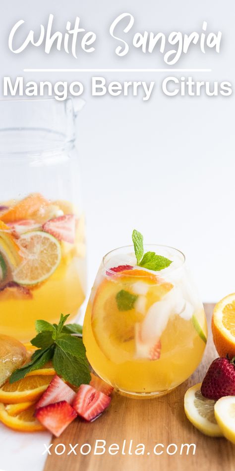 This mango citrus berry white sangria packs such a flavour punch. It’s a refreshing summer drink which everyone will love. Red sangria, made with red wine, might be the better known version, but this white sangria with summer fruit is the perfect choice for the summer. This is a super easy sangria recipe you can whip up anytime. If you are looking for a summer fruit cocktail recipe, you need to make this! #sangria #mango #lemon #orange #lime #strawberry #cocktail #whitewine #pitcher #summerdrink Iced Green Tea Recipe, Brunch Cocktail Recipes, Brunch Punch, Easy Alcoholic Drinks, Strawberry Cocktails, Mimosa Recipe, Green Tea Recipes, Brunch Spread, Iced Green Tea