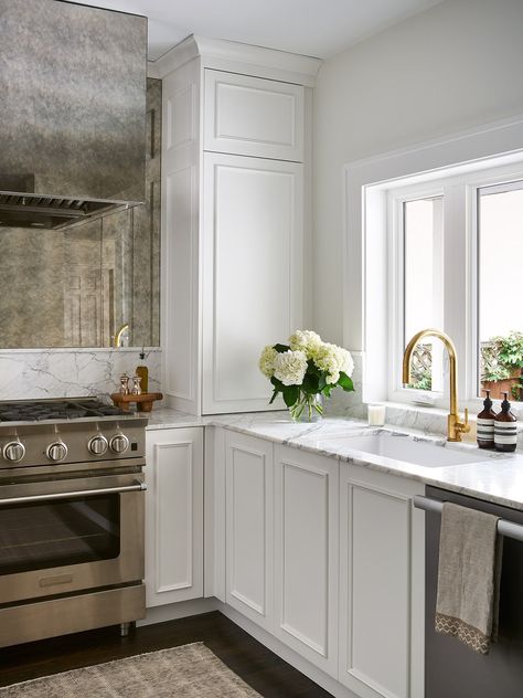 Recreate the Look of This 150-Square-Foot Galley Kitchen That Shines With French Flair | Architectural Digest Petite Kitchen, Shaker Style Cabinet Doors, Large Computer Desk, Dutch Colonial, Galley Kitchen, Kitchen Cabinetry, European Vintage, Space Planning, Wainscoting