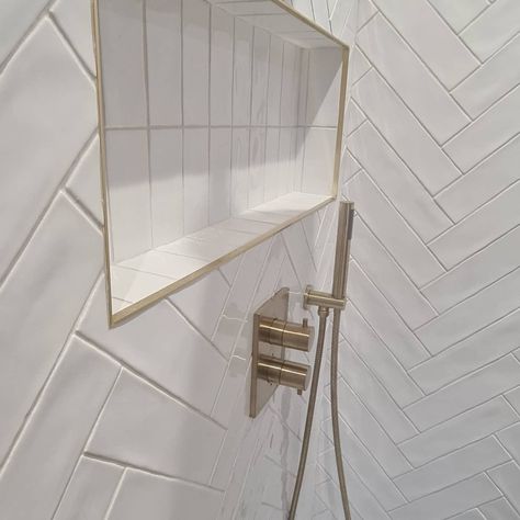 Herringbone Tile Shower Ideas, Shower Niche Herringbone Tile, Herringbone Tile Wall Bathroom, Chevron Tile Shower Wall, Shower Trim Ideas, Shower Herringbone Tile, Herringbone Tile Shower Wall, Herringbone Bathroom Wall, Bathroom Tile Herringbone