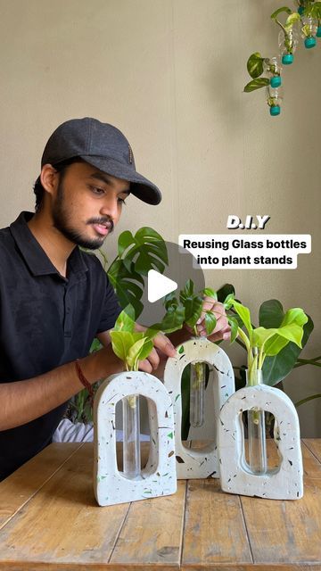 Reuse Bottles Glass Diy, Glass Test Tube Crafts, How To Break Glass For Crafts, Test Tube Decor Ideas, Reusing Glass Bottles, Stands For Plants Pots, Test Tube Art, White Cement Diy Craft, Reuse Glass Bottles