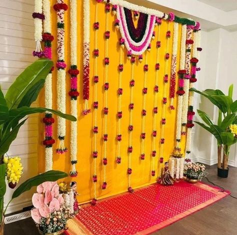 NOTE  Items included:- FRAMES - WITHOUT FRAMES  UTENISLS- WITHOUT UTENISLS IRON STAND - WITHOUT STAND  SMALL BELL - YES INCLUDED GANPATI DECOR - YES  Green  Backdrop cloth , Size - 12*8ft ,  Yello Lotus Backdrop Clothes  Material - Raw silk Garlands - 6 pieces , size - 6ft Middle arches - 3 pieces Lilly Hangings - 9 pieces - 6 ft Small Hangings - 10 pieces - 1 ft Yello Flower Garland - 10 Pieces - 7 feetThis is Beautiful Handmade Cloth garlands backdrop set for housewarming decor 8*8 feet ka bac Backdrop Decorations For Pooja, Pooja Backdrops, Pooja Backdrop Decoration, Varalakshmi Decoration, Gauri Decoration, House Warming Decor, Fabric Garlands, Mehndi Decoration, Ganpati Decor