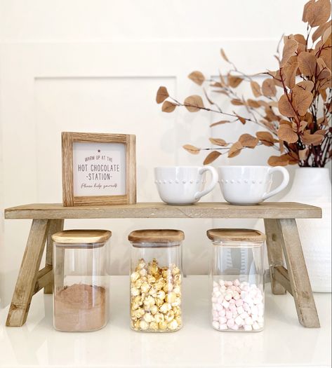 Cozy up your space! 🍂 Introducing our rustic hot chocolate station essentials. Perfect for those chilly nights in. From elegant mugs to adorable storage jars, we’ve got you covered. Dive into warmth, one sip at a time! ☕️✨ #HomeDecor #WarmVibes #HotChocolateLovers | 📍 Stubbington Hampshire | 🛍️ Shop Now Bar Armoire Ideas, Milkshake Station, Coffee Bar Armoire Ideas, Coffee Bar Armoire, Christmas Hot Chocolate Station, Hot Cocoa Station, Cocoa Station, Coffee Bar Cart, Hot Chocolate Station