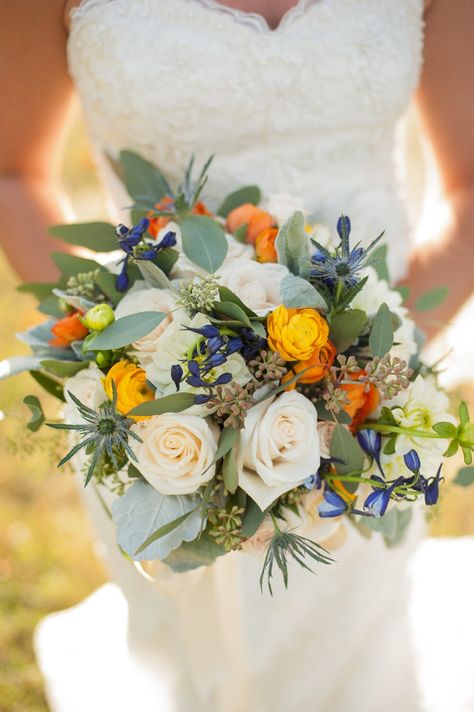 Stunning bouquet! photo by http://www.twilasphotography.com, see more: http://theeverylastdetail.com/orange-cornflower-blue-tennessee-wedding/ Orange White Bouquet, Blue Wedding Flowers Bouquet, Cornflower Blue Bridesmaid Dresses, Cornflower Blue Wedding, Country Wedding Flowers, Gum Leaves, Bright Wedding Flowers, Orange Wedding Flowers, Bouquet Photo