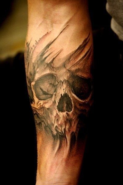 This forearm tattoo highlights a ghastly yet strikingly beautiful face of a skull. It seems to have a life of its own with long black veins above and below the intricate drawing this delicately inked picture is made up of. #tattoofriday #tattoos #tattooart #tattoodesign #tattooidea Skull Sleeve Tattoos, Skull Sleeve, Biker Tattoos, Sugar Skull Tattoos, Geniale Tattoos, Celtic Tattoos, Skull Tattoo Design, Badass Tattoos, 문신 디자인